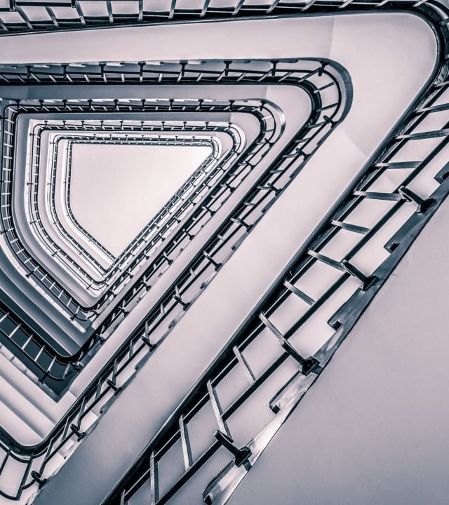 An abstract view of a modernist staircase with geometric patterns in Hamburg.